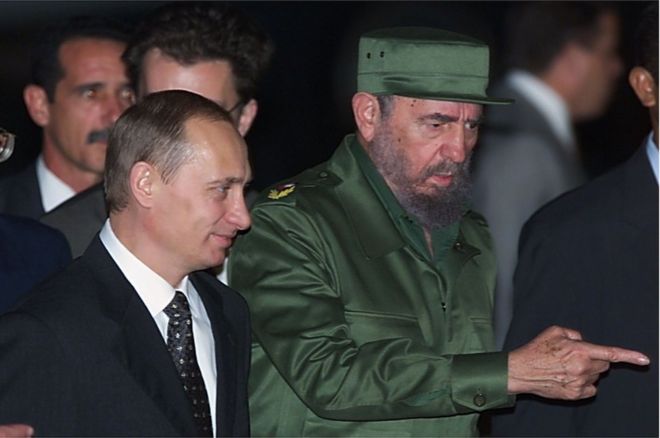 Cuban President Fidel Castro welcoming Russian President Vladimir Putin at Jose Marti Airport in Havana on December 13, 2000
